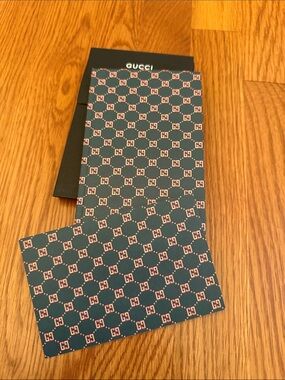 Gucci boutique notebook with stickers.